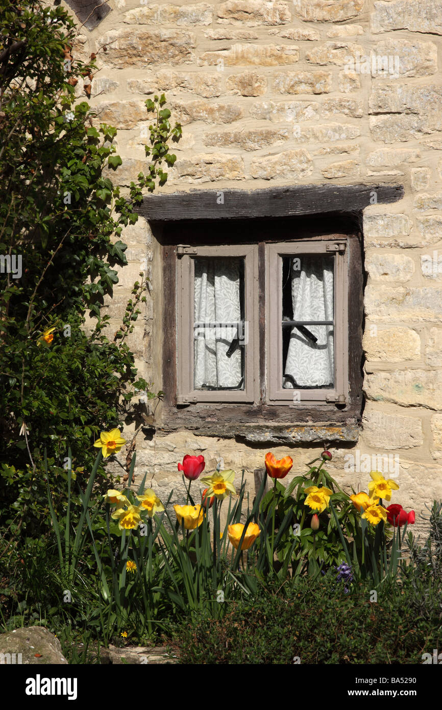 Close up of a Cottage window near Arlington Row, Bibury, Cotswolds, spring UK Stock Photo