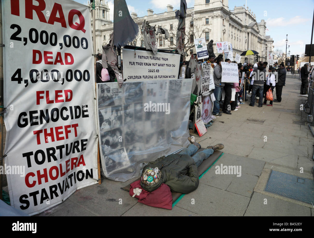 Group of Tamil protesters demonstrating over the fighting in Sri Lanka, outside Parliament Square, London England, UK. Stock Photo