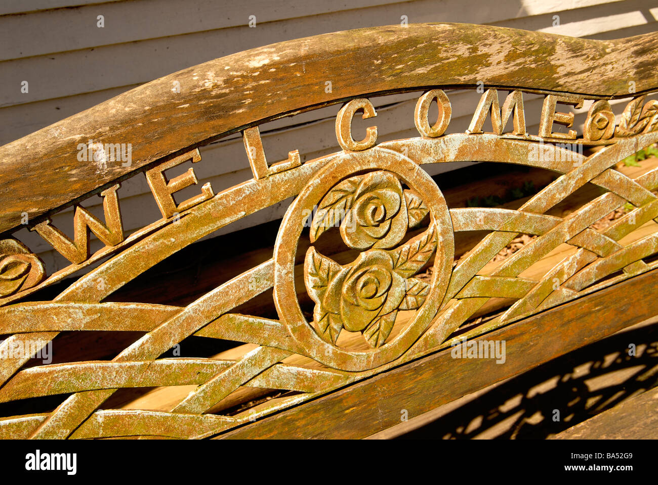 Welcome sign in the back of a bench in Old Town Spring Texas Stock Photo