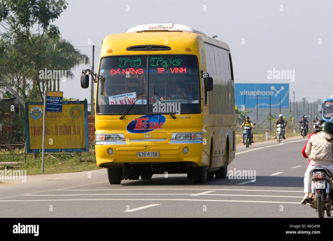 Long distance bus traveling near Hue Vietnam Stock Photo