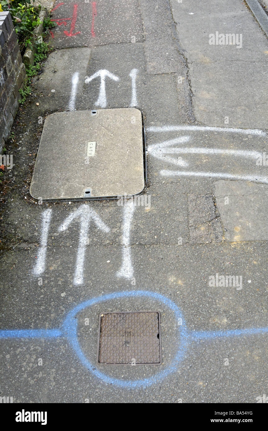 Roadworks markings to replace gas pipes in suburban residential street