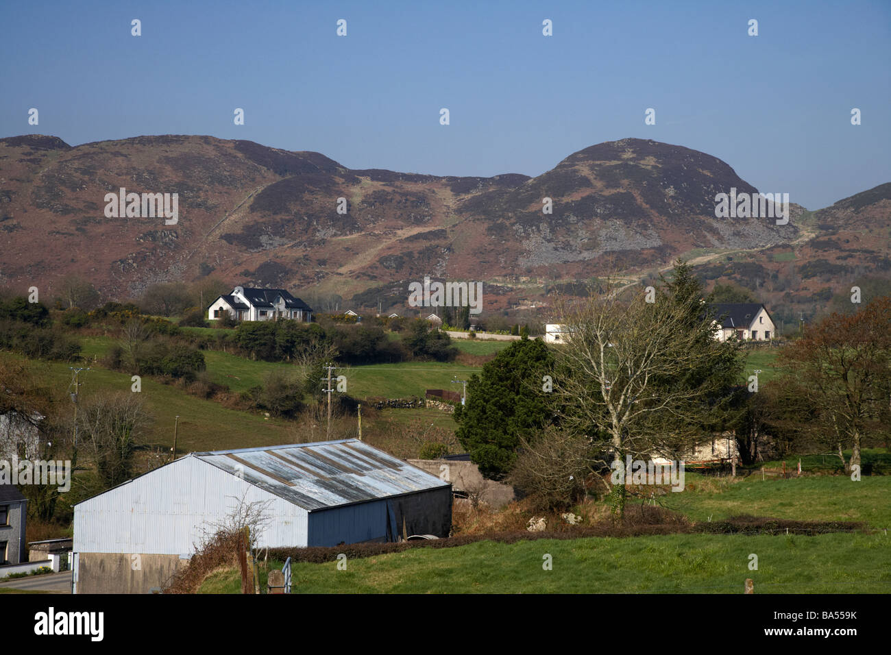 old farms and modern homes in the ring of gullion countryside south armagh northern ireland uk Stock Photo