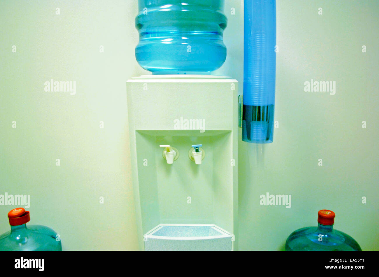 Drinking water bottles and drinking cups in an office setting Stock Photo Alamy