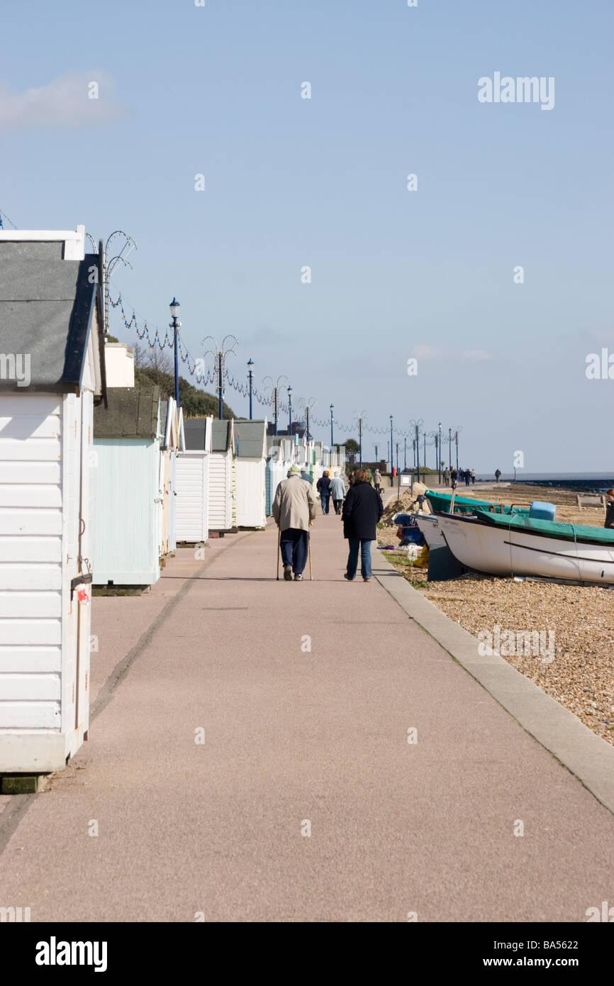Beach huts and promenade Felixstowe Suffolk England Stock Photo