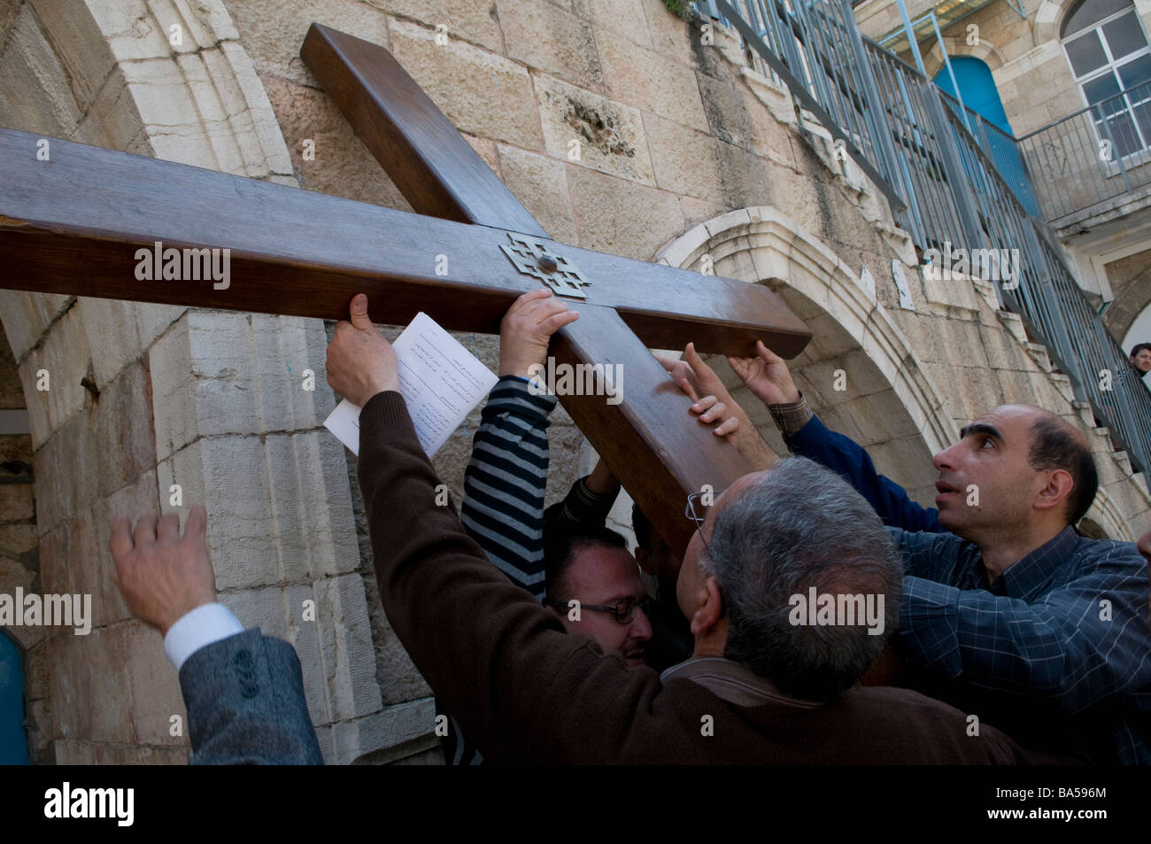 Christian Arabs at the 1st Station of the Cross located in 'Madrasa el ...