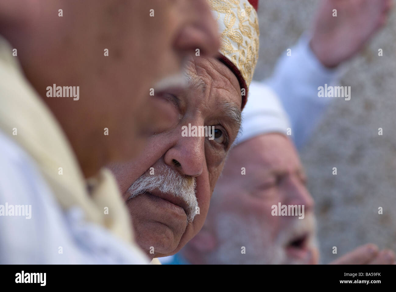 Members of the Samaritan sect with ancient roots in Judaism celebrating the Passover feast on mount Gerizim in West Bank Israel Stock Photo