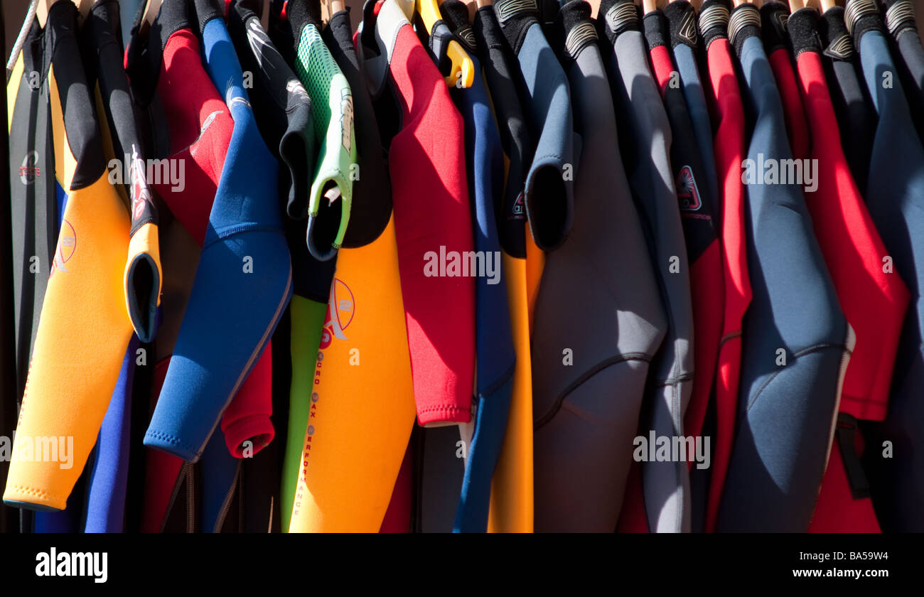 Yellow wet suits hi-res stock photography and images - Alamy