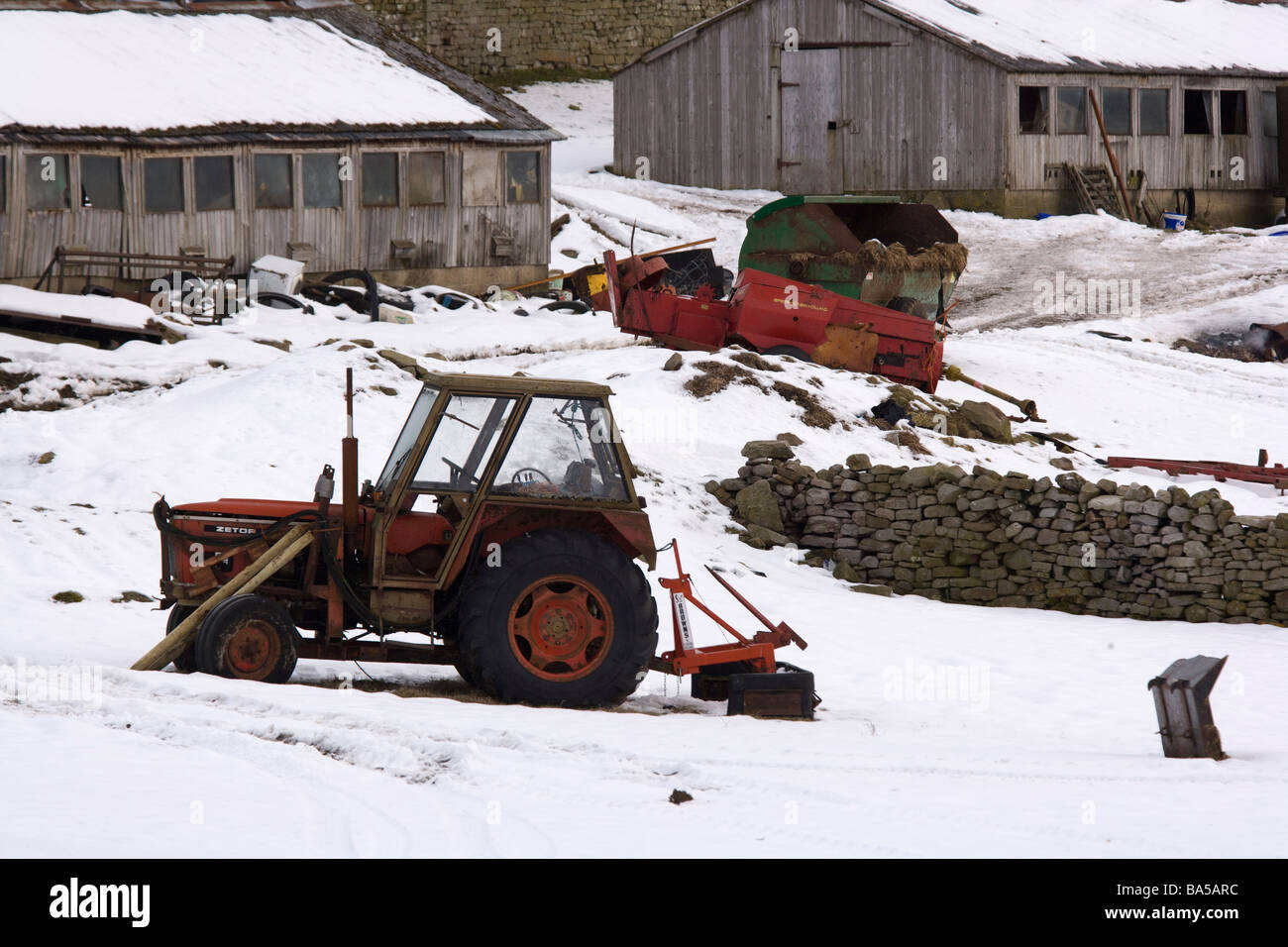 A farm and tractor at Healaugh in Swaledale North Yorkshire England UK Stock Photo
