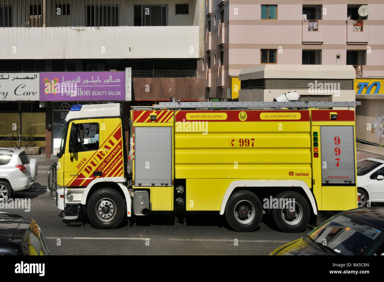 Dubai street scene UAE fire engine truck with Civil Defence markings