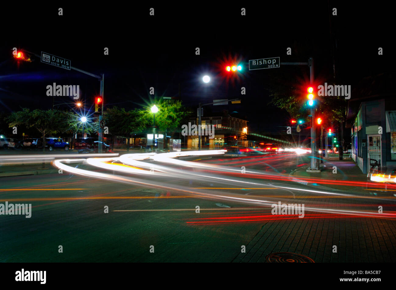 Urban, night, time exposure, full moon, streaked lights, stop lights, traffic, roadways, autos, safety, social issues, crime, Stock Photo