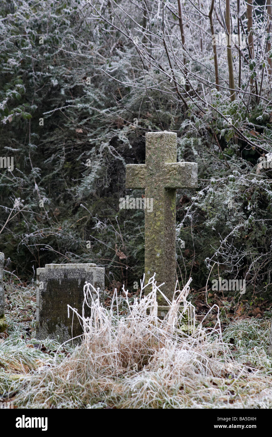 Graveyard of St. John the Baptist church at Ebbesbourne Wake, Wiltshire, UK covered with hoar frost hoarfrost hoarfrost in January Stock Photo