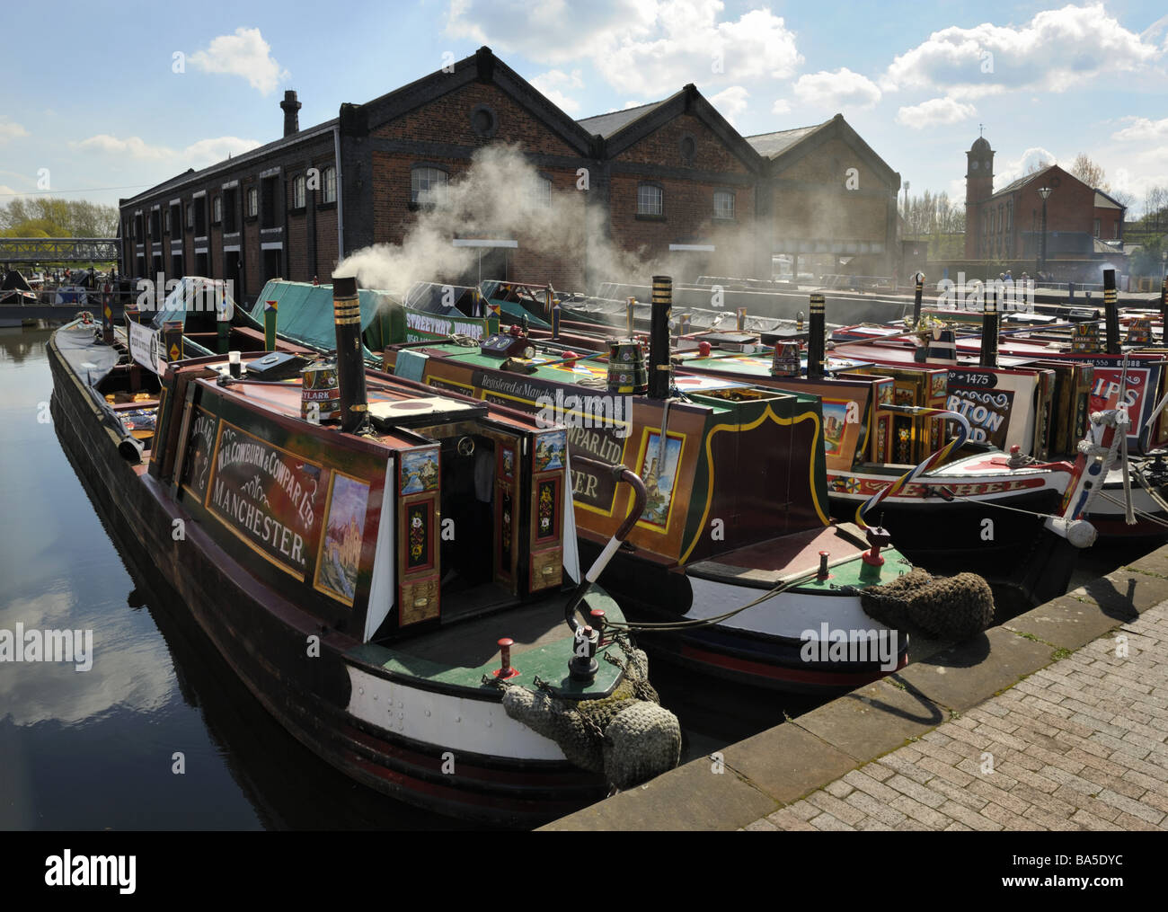 A line of traditional narrowboats at The Boat Museum, Ellesmere Port, Cheshire. Stock Photo