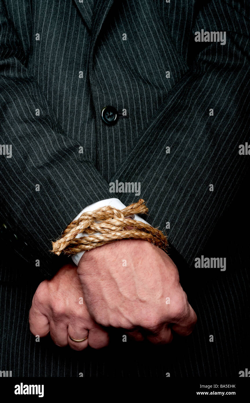Hands tied with rope hires stock photography and images Alamy