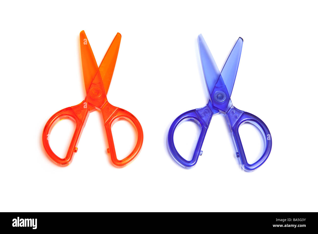Plastic kids safety scissors isolated on a white studio background Stock Photo