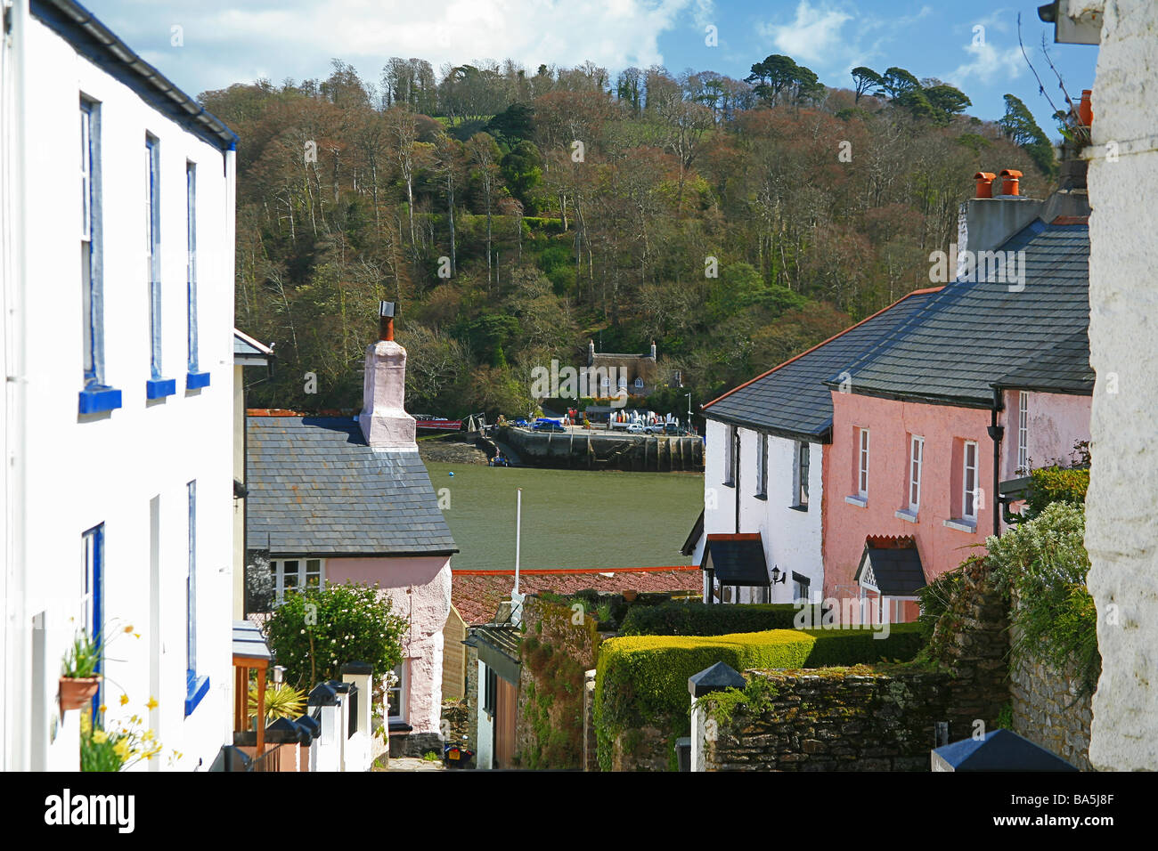Looking down Manor Street in Dittisham across the River Dart to Greenway Quay, Devon, England, UK Stock Photo