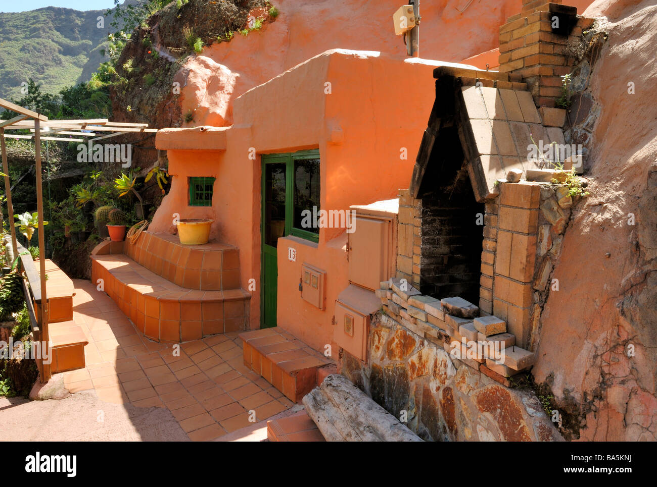 A fine view to the quirky exterior of the cave house in the Barranco de Guayadeque, Guayadeque Ravine, Cueva Bermeja, Gran Canar Stock Photo