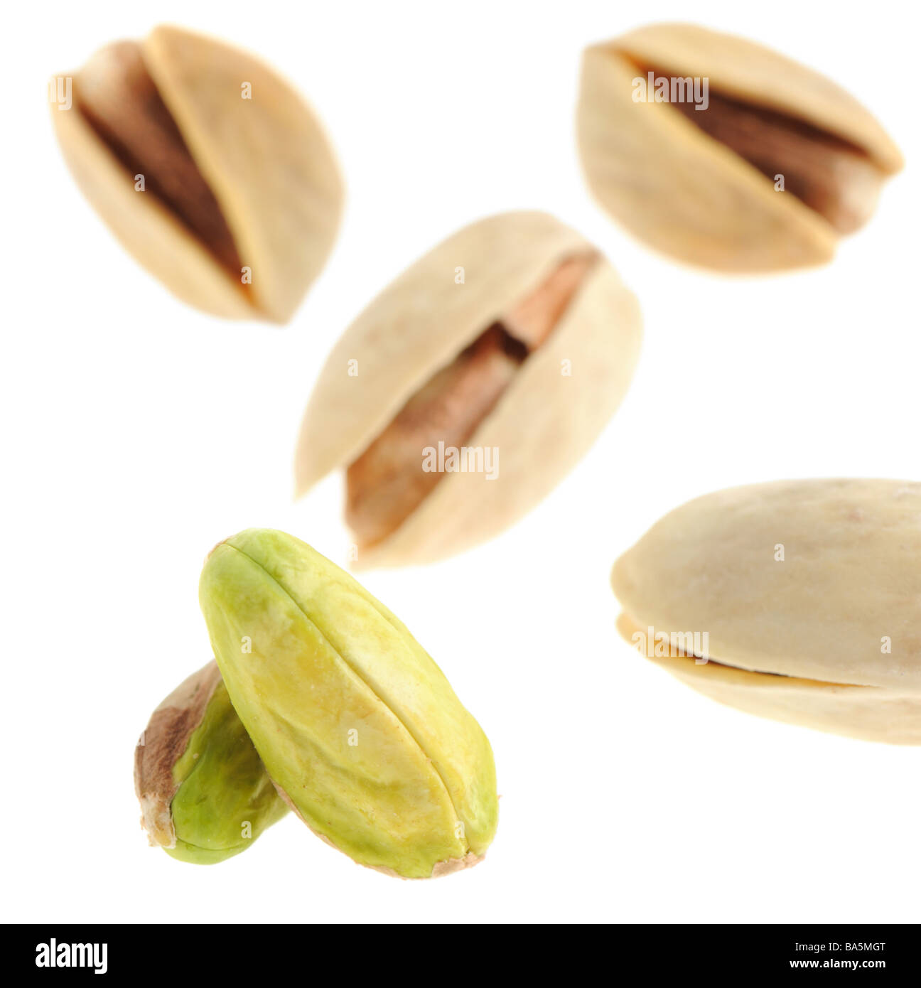 Pistachioes Nuts it is isolated on a white background Stock Photo