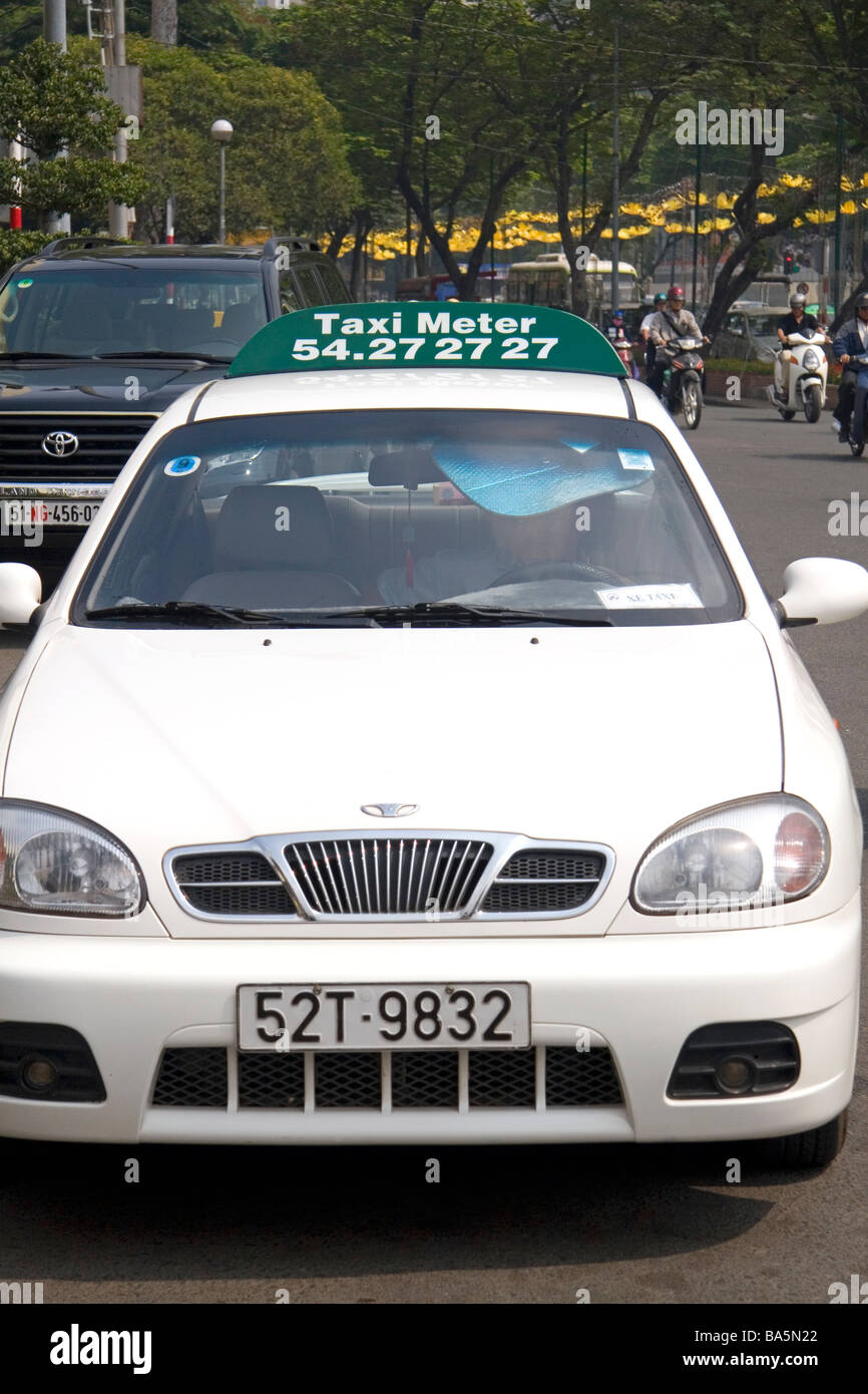 Taxi on the street in Ho Chi Minh City Vietnam Stock Photo