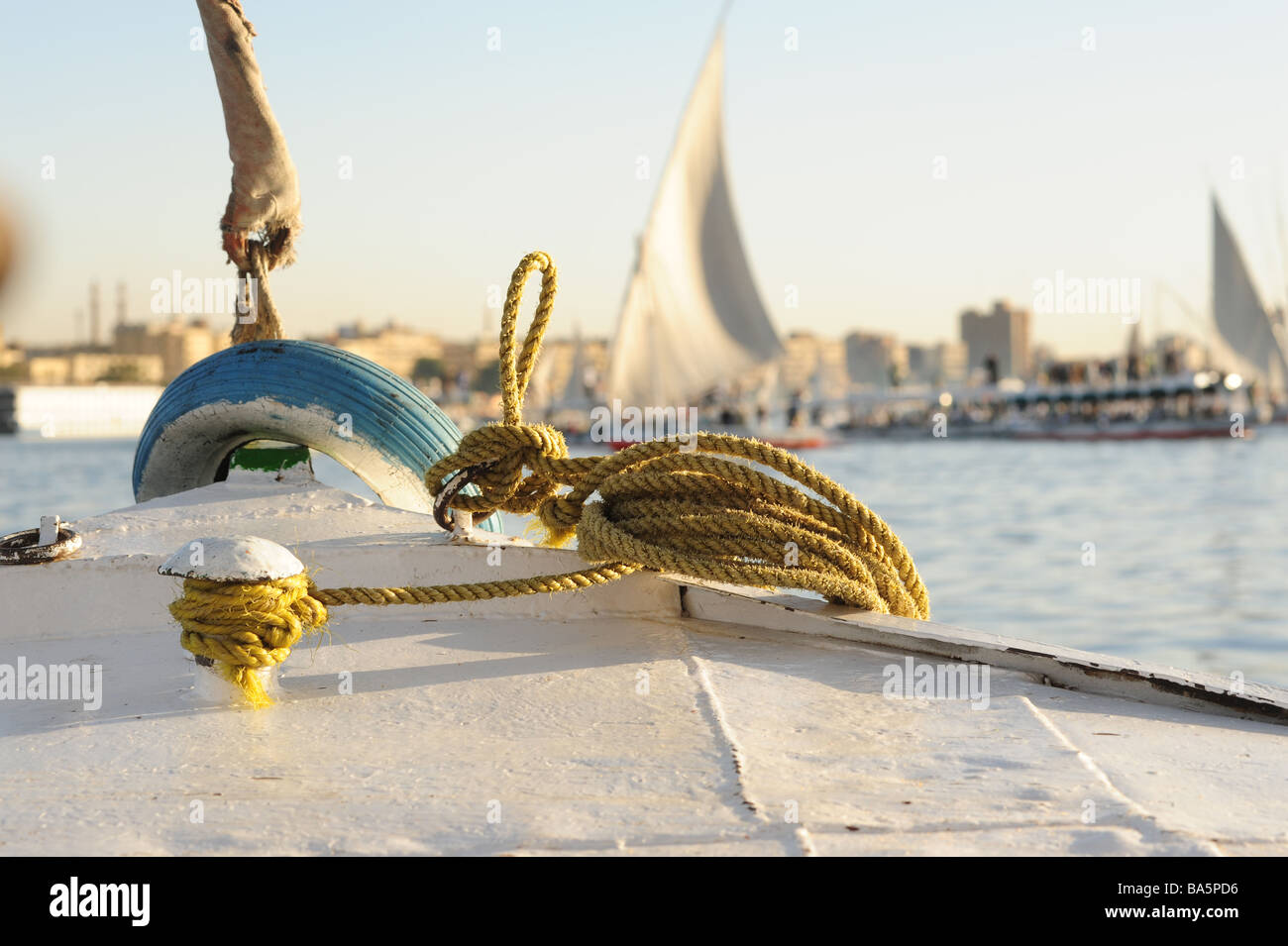 Egypt Aswan felucca boats ply the Nile River Stock Photo