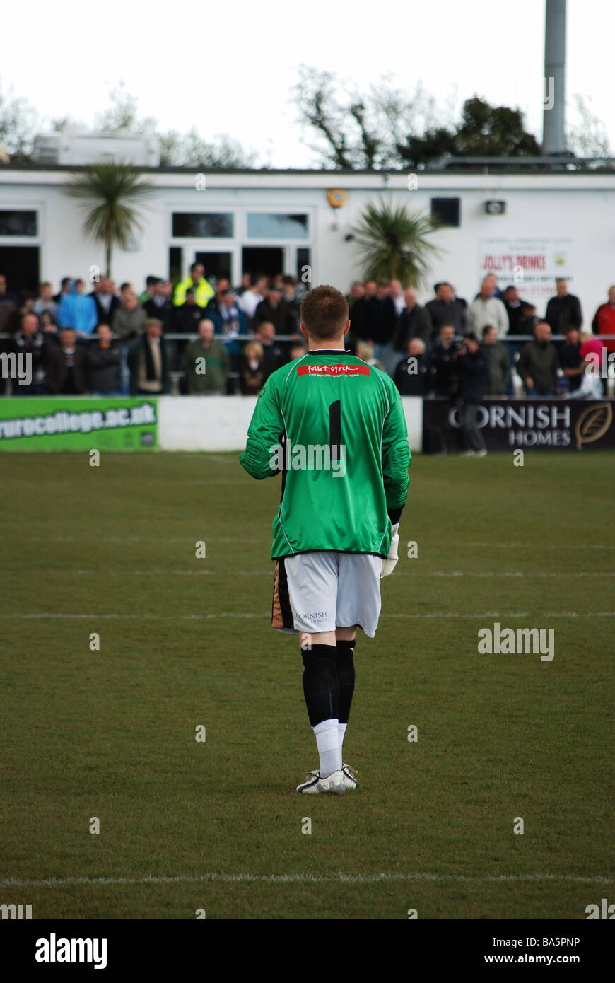 a view from behind of the truro city goalkeeper Stock Photo