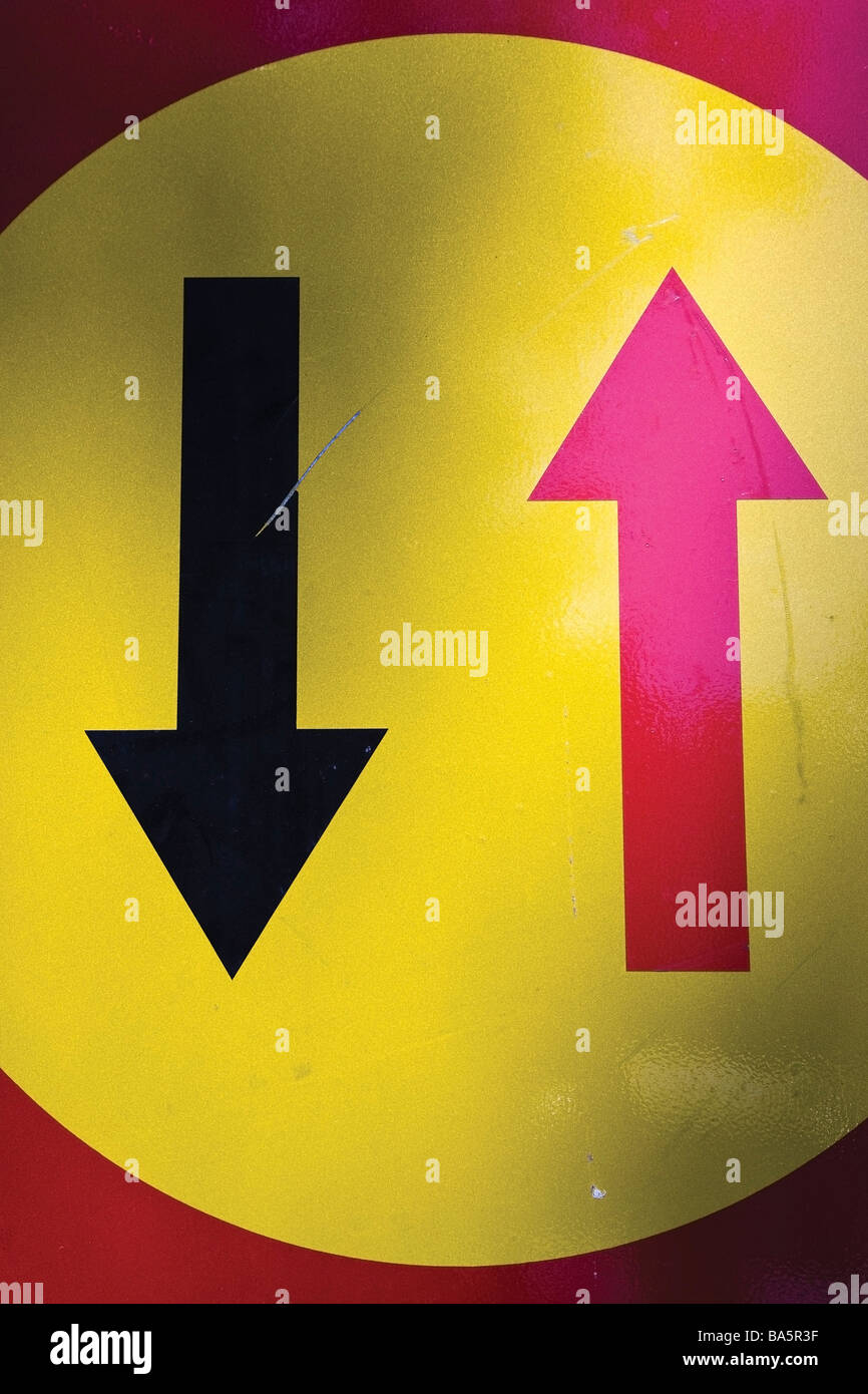 Traffic sign with red and black arrows declaring right of way Stock