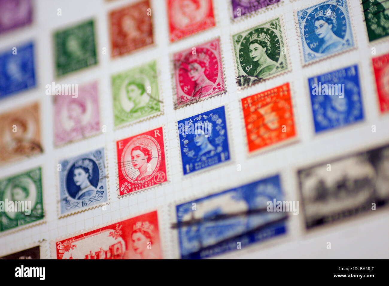 British stamps in an album 1950s Stock Photo Alamy