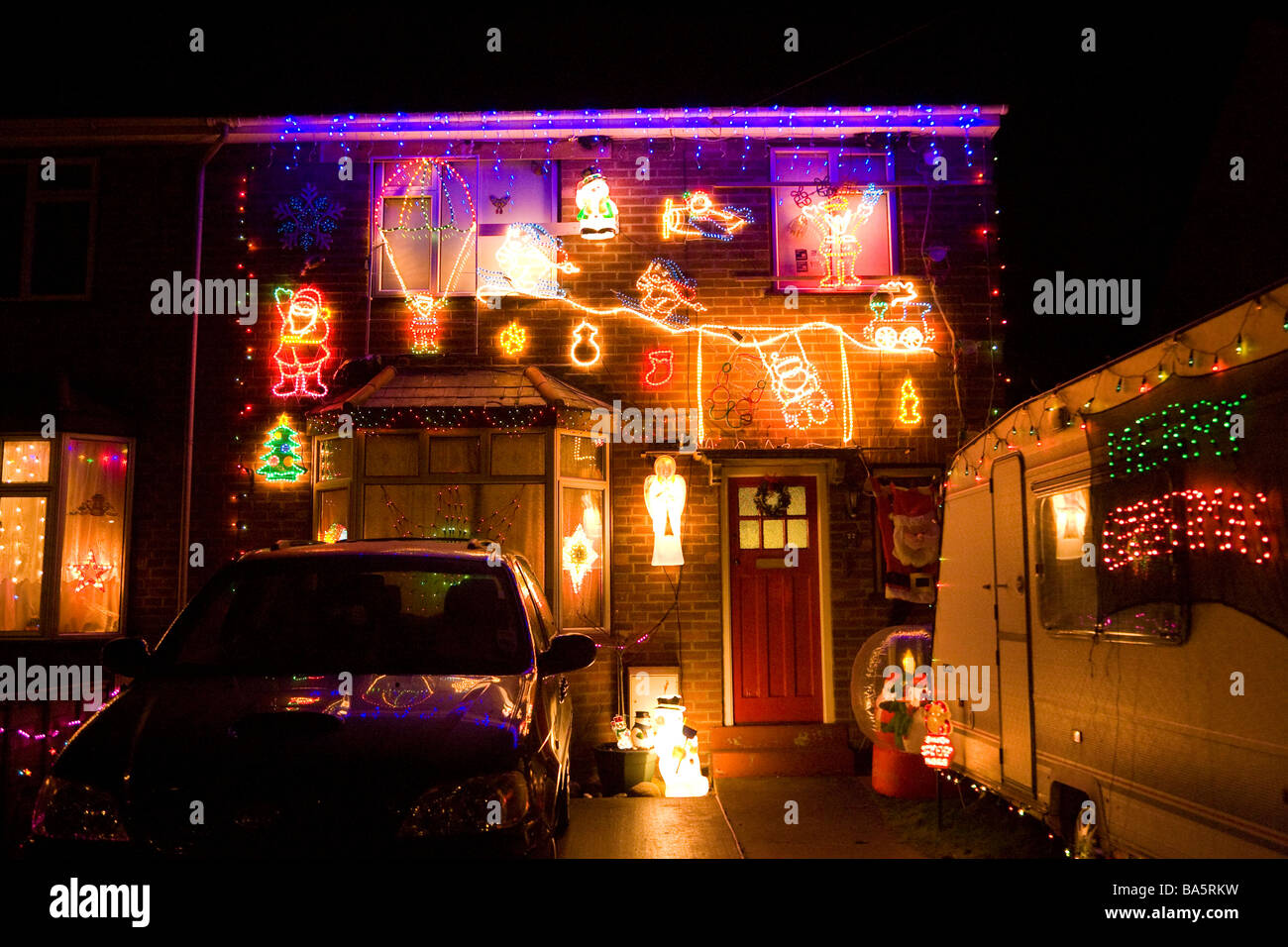 Christmas lights on the front of a house in Suffolk, UK Stock Photo Alamy