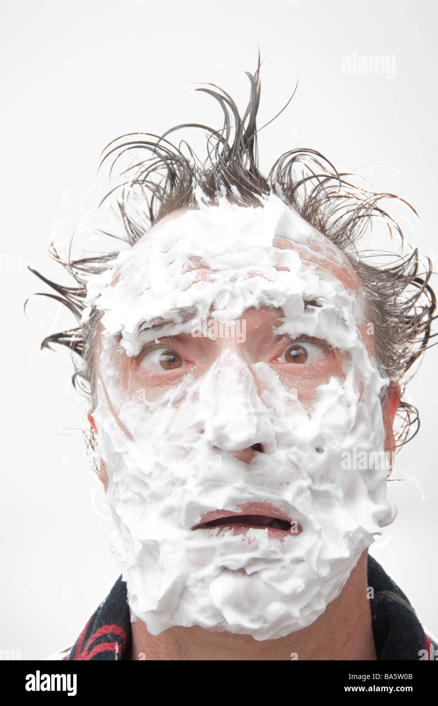 humourous-portrait-of-man-with-shaving-cream-covering-his-face-BA5W0B.jpg