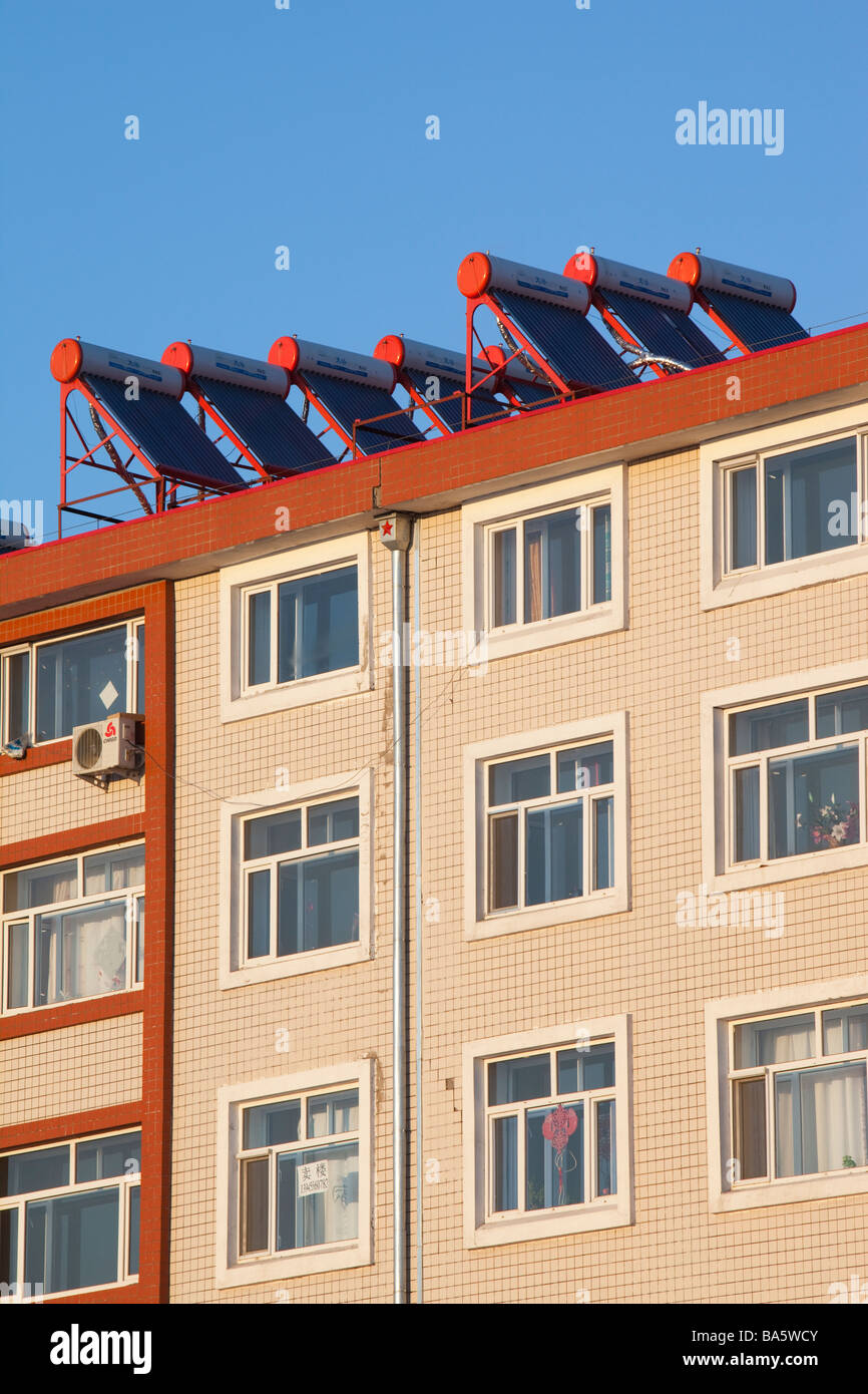 solar water heaters on an apartment roof in Suihua city in northern China  Stock Photo - Alamy