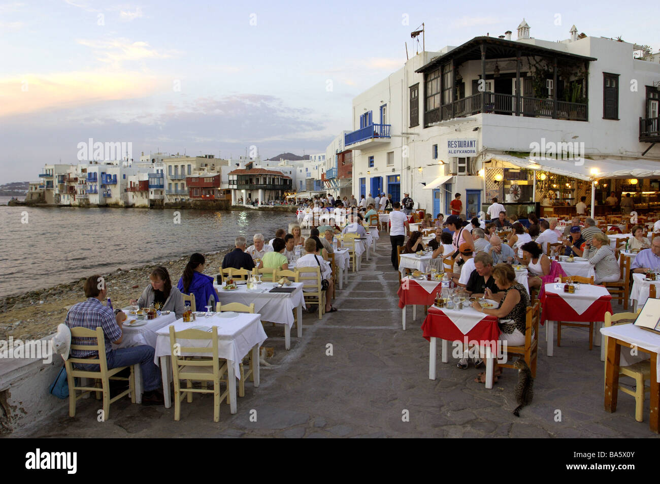 Greece island Mykonos Chora beach restaurant tourists Europe Kykladen Mediterranean-island Mykonos-Stadt island-main-place Stock Photo