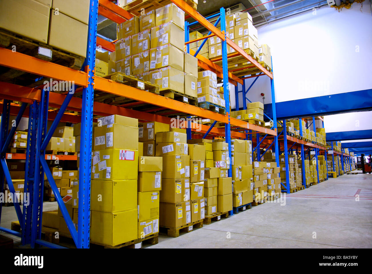 Warehouse shelves stacked with boxes Stock Photo Alamy