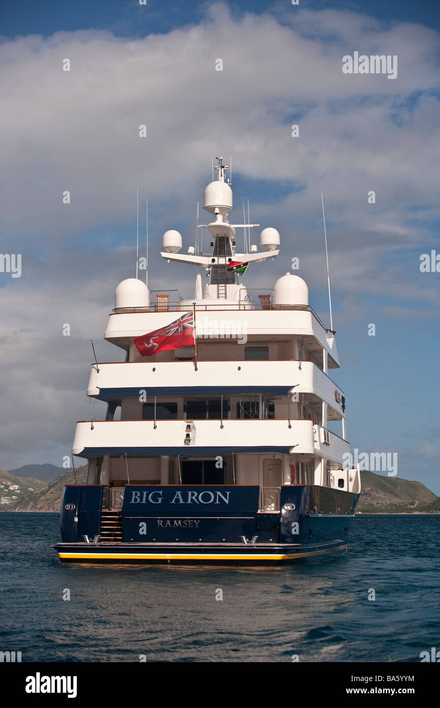 Superyacht 'Big Aron' underway off St Kitts from the stern Stock Photo