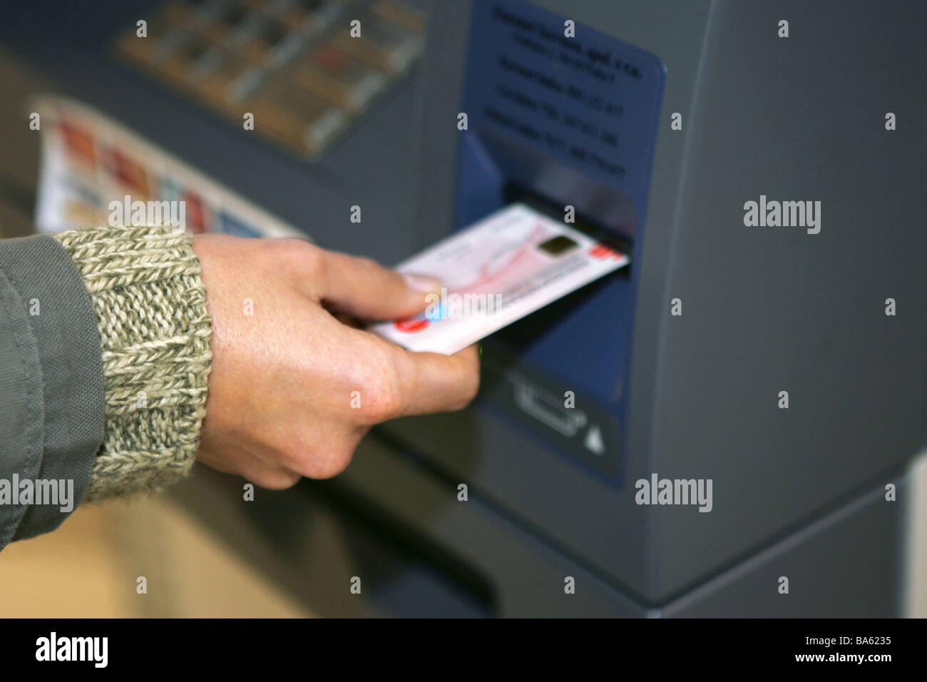 Woman detail hand automatic teller card introduces series people money ...