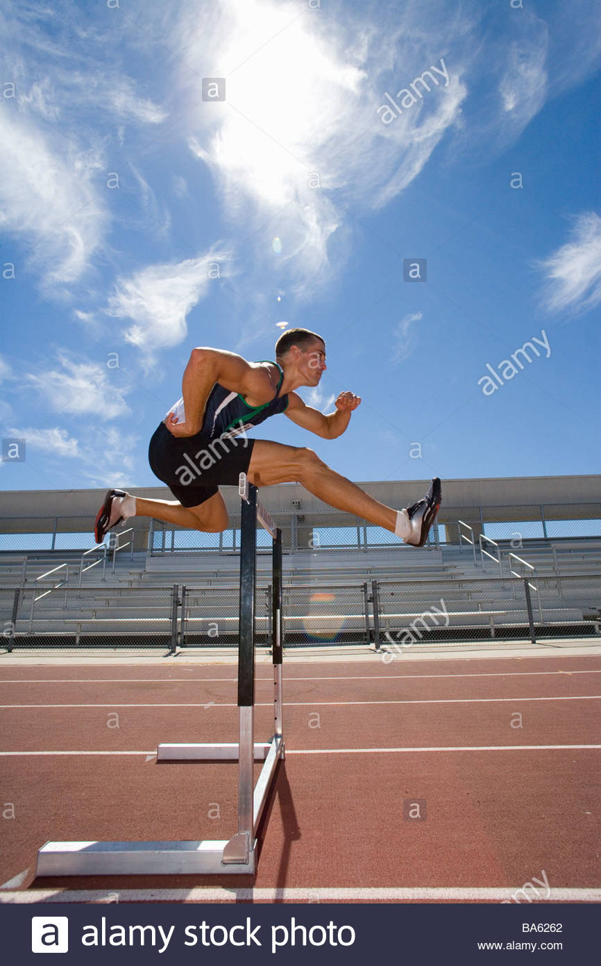 Man Jumping Hurdle Stock Photos & Man Jumping Hurdle Stock Images - Alamy