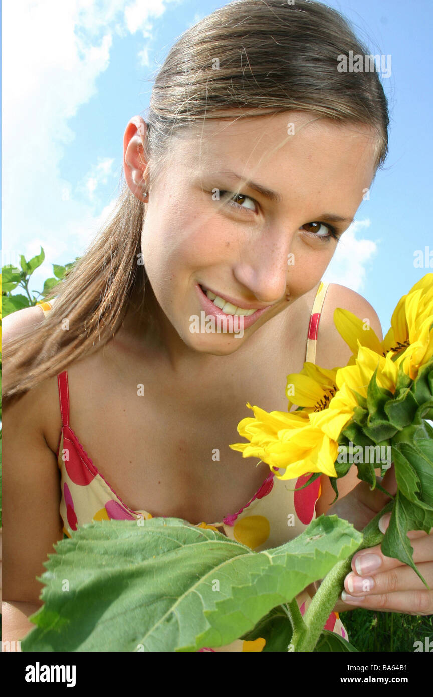 Woman young sunflower smiles portrait Stock Photo - Alamy