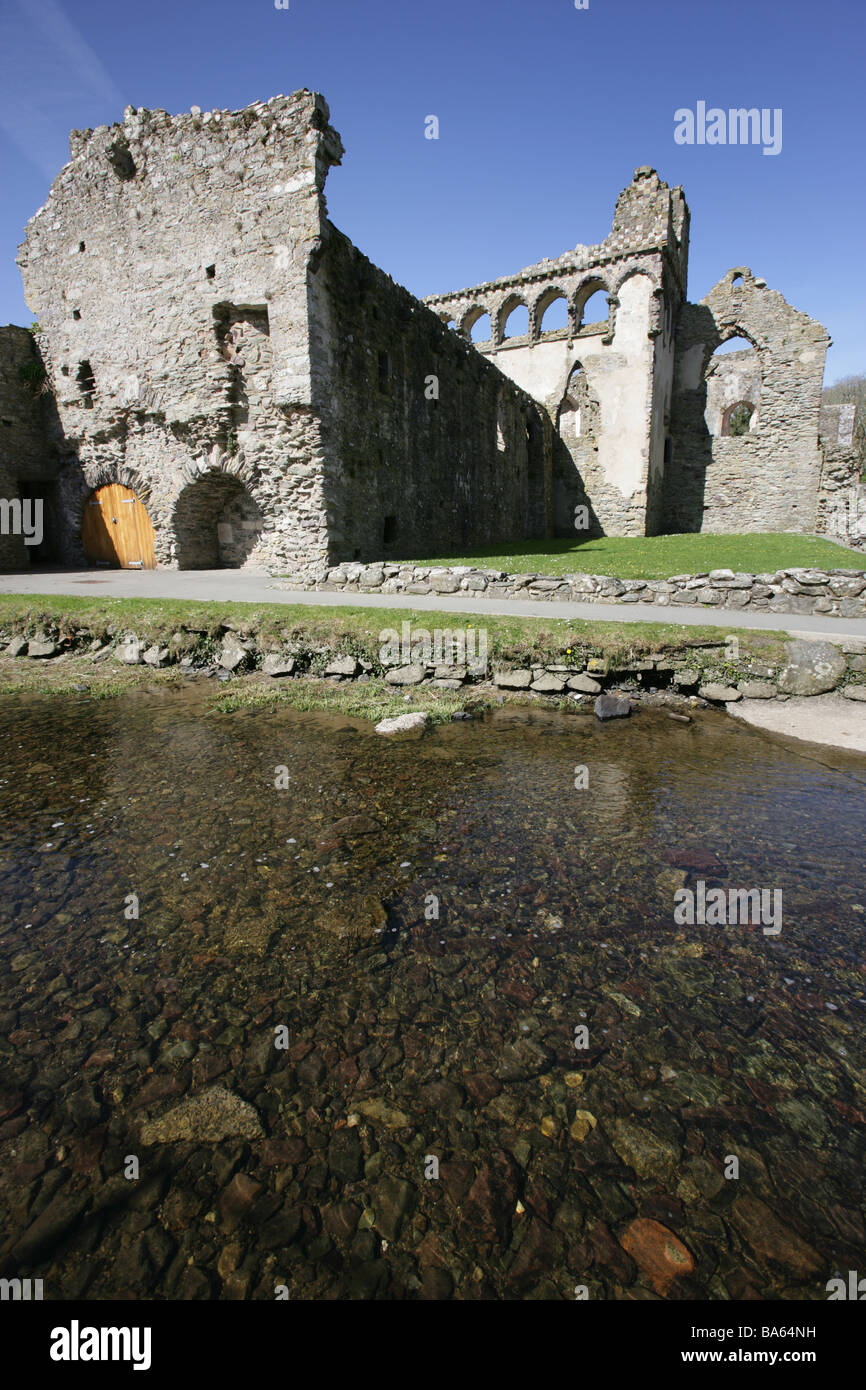 City of St David’s, Wales. Stream with the early 14th century Bishop’s Palace Chapel in the background. Stock Photo