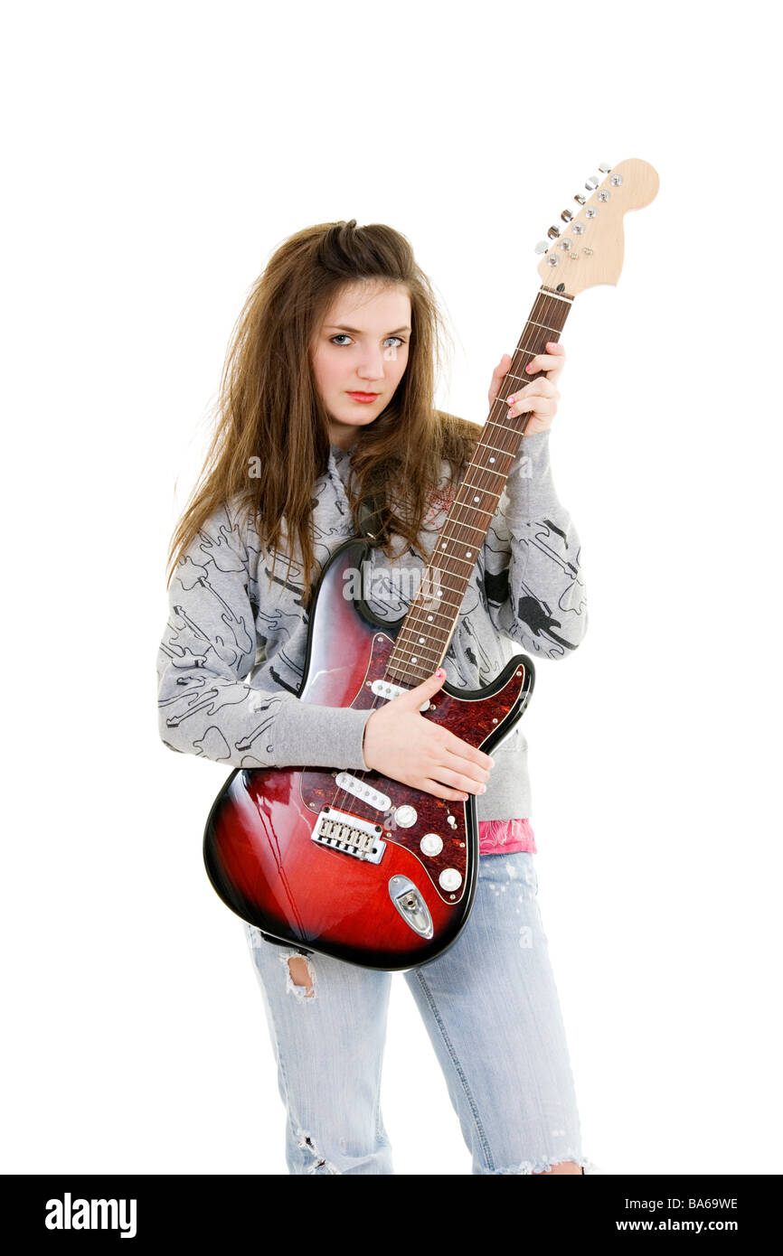 Caucasian teenager posing as a punk rocker on white background Stock Photo