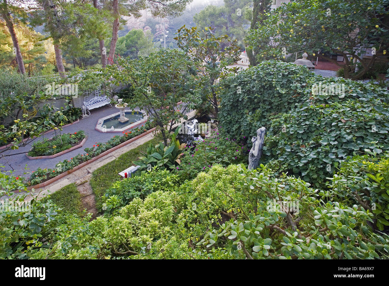 Park detail from above park grounds park-figures statue wells shrubs plants lemon-tree nature vegetation color-mood color green Stock Photo