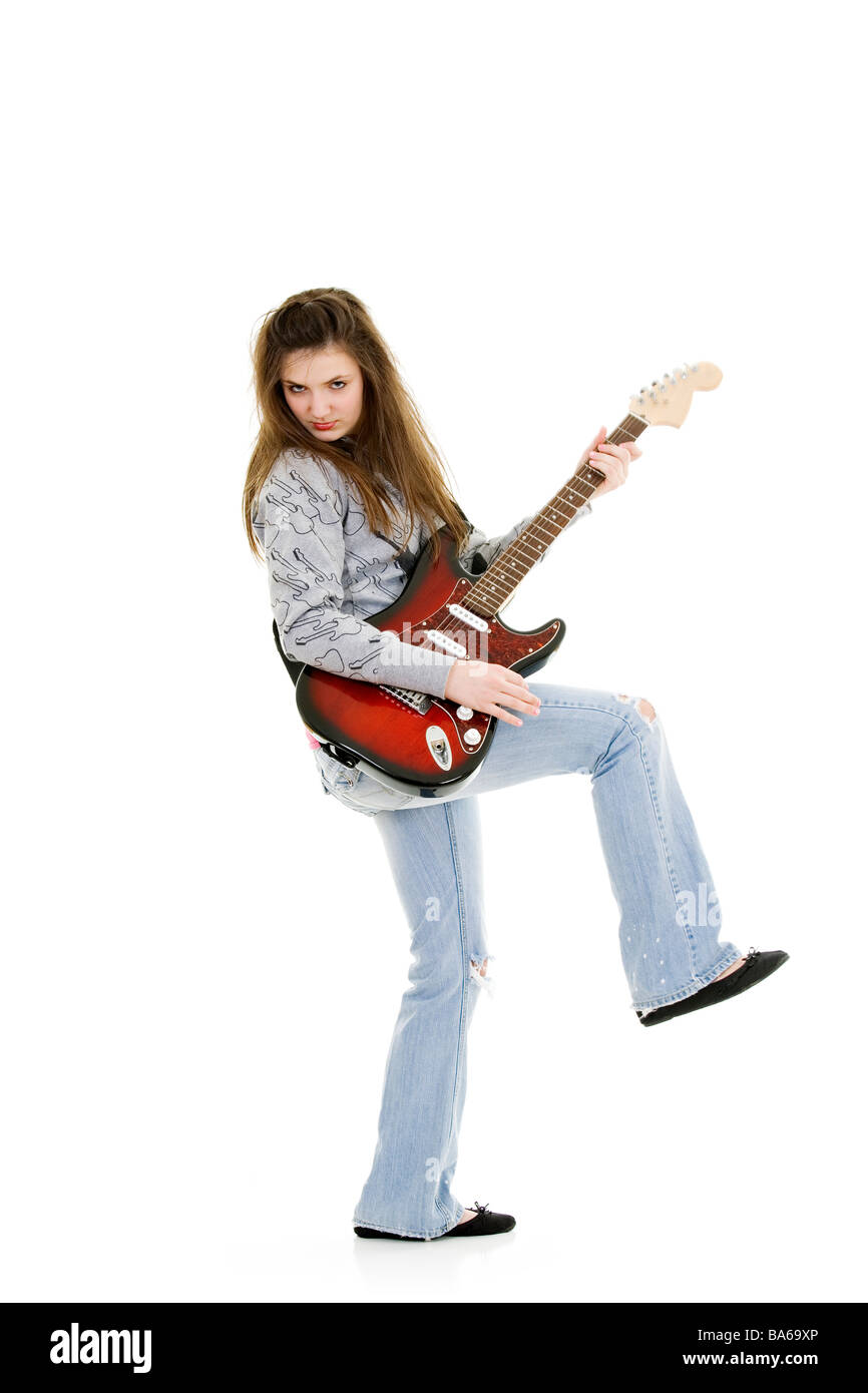 Caucasian teenager posing as a punk rocker on white background Stock Photo