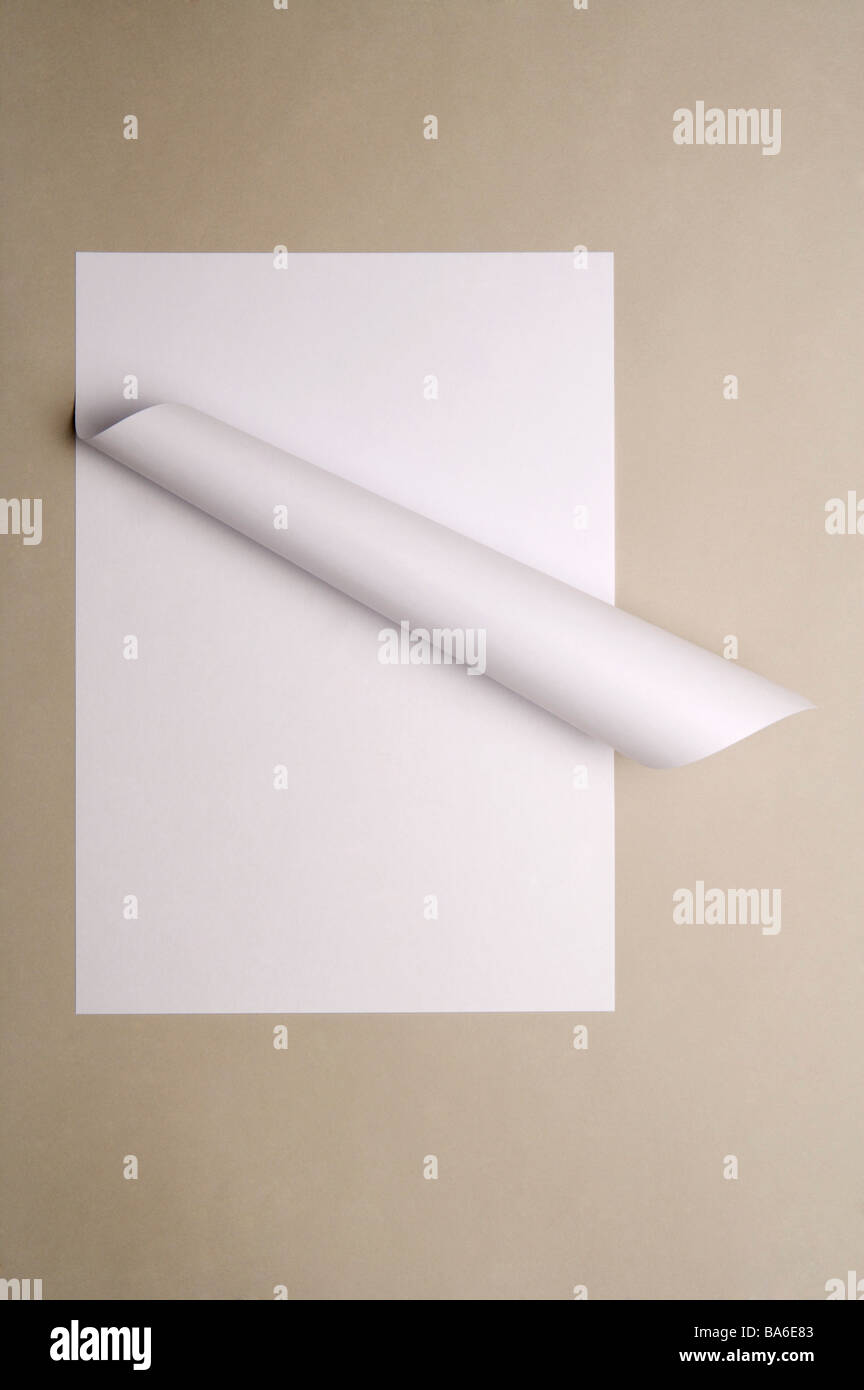 Crumpled paper above another paper Stock Photo - Alamy