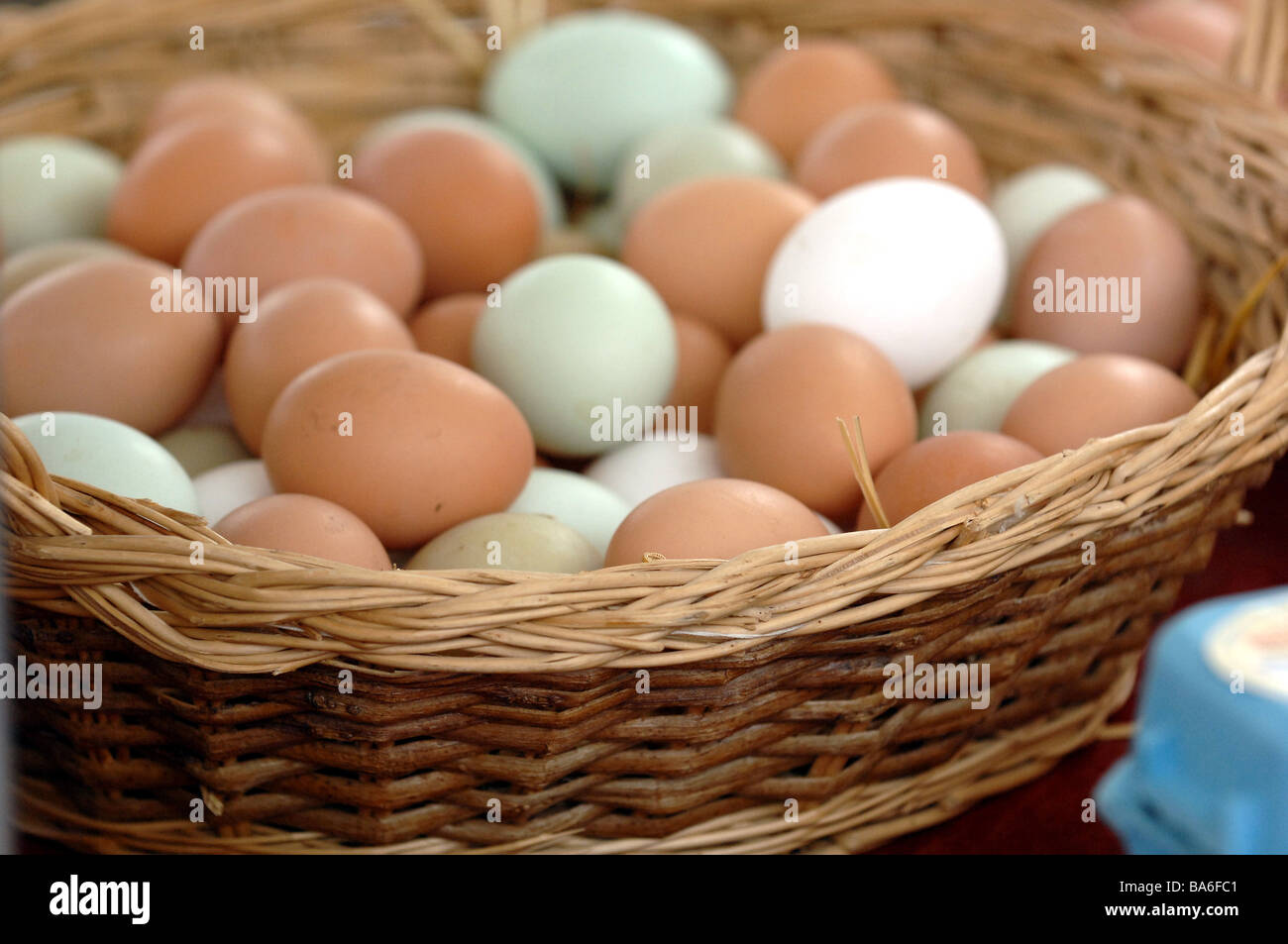 A basket of free range eggs on display Stock Photo