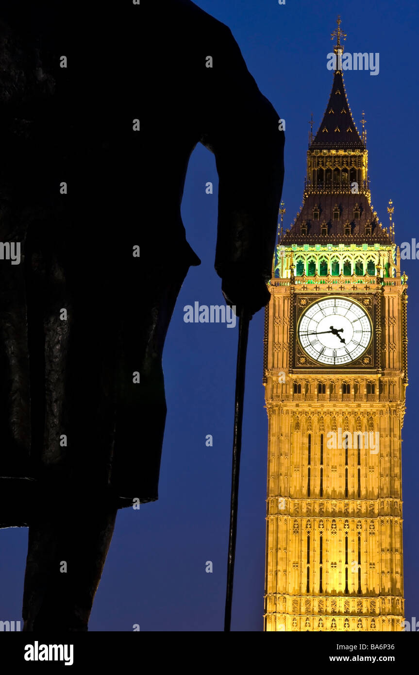 Statue of Winston Churchill and Big Ben seen from Parliament Square in front of Houses of Parliament Westminster London UK Stock Photo