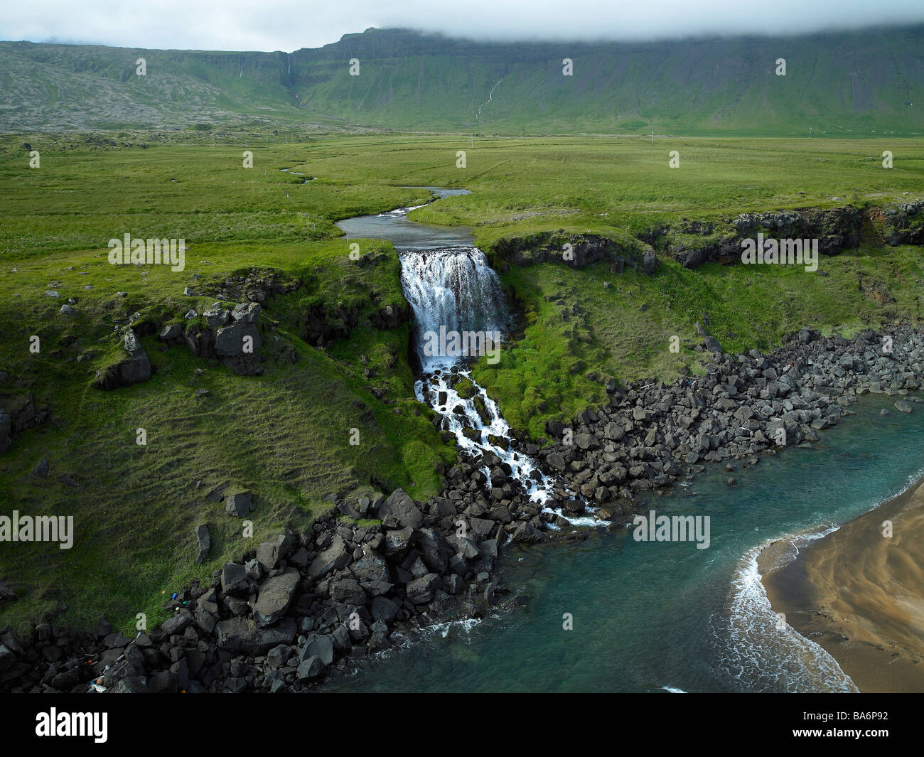 Waterfall with lava and moss, Snaefellsnes Peninsula, Iceland Stock Photo
