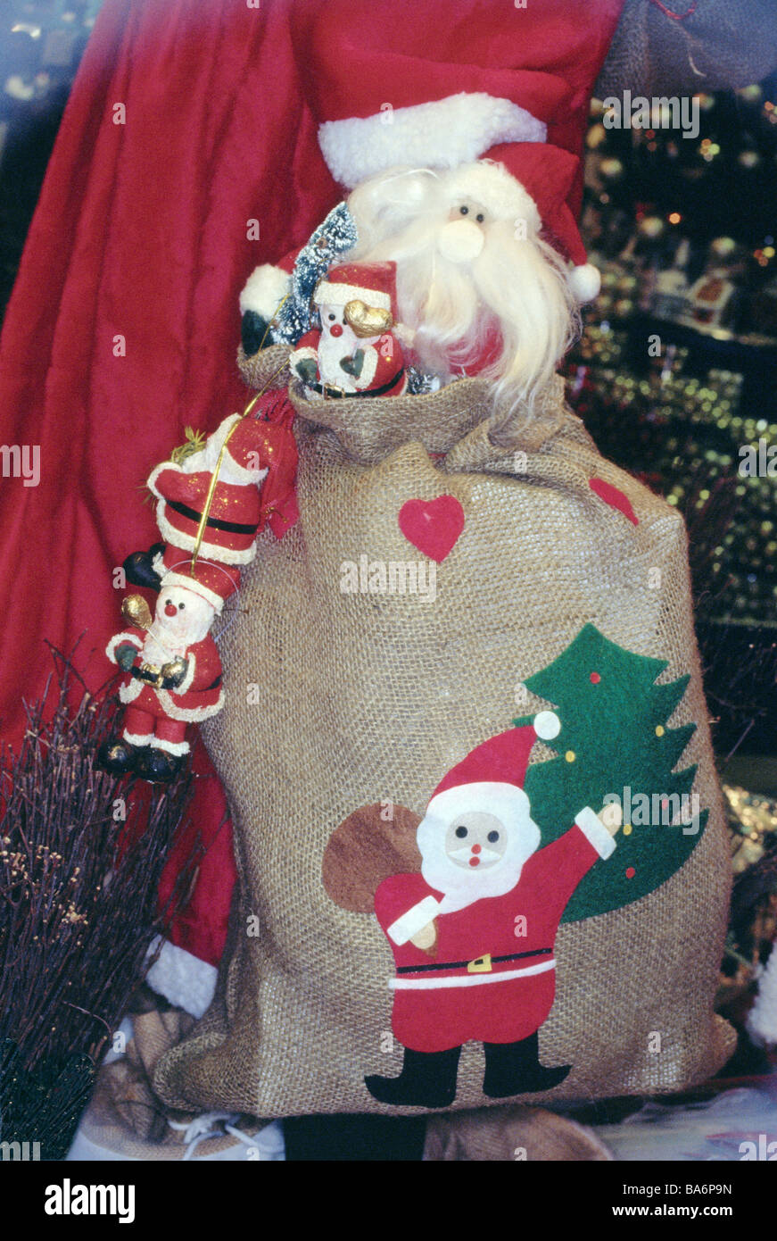 Santa Claus detail jute-sack Nikolaus-figures Nikoläuse Santa Claus figures toy sack gift-sack rod concept childhood education Stock Photo