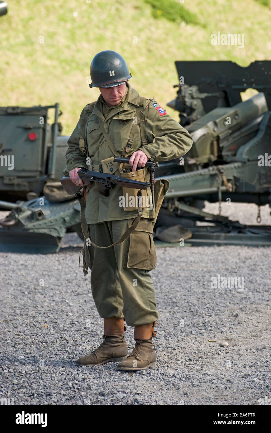 WW2 american soldier loading his machine gun at fort nelson reenactment. Stock Photo