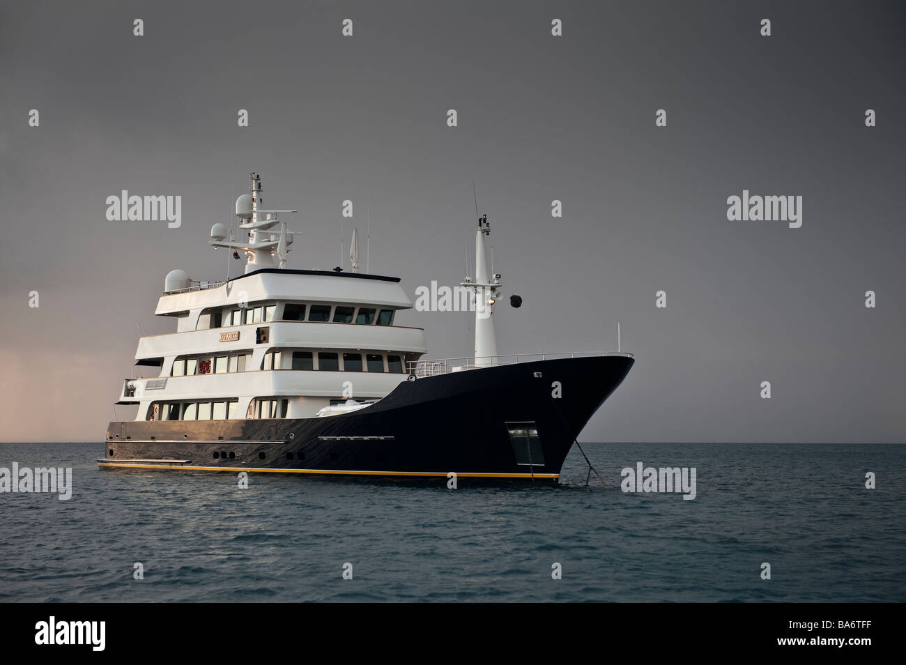 Superyacht Big Aron is at anchor off Charleston on a stormy afternoon near sunset Stock Photo