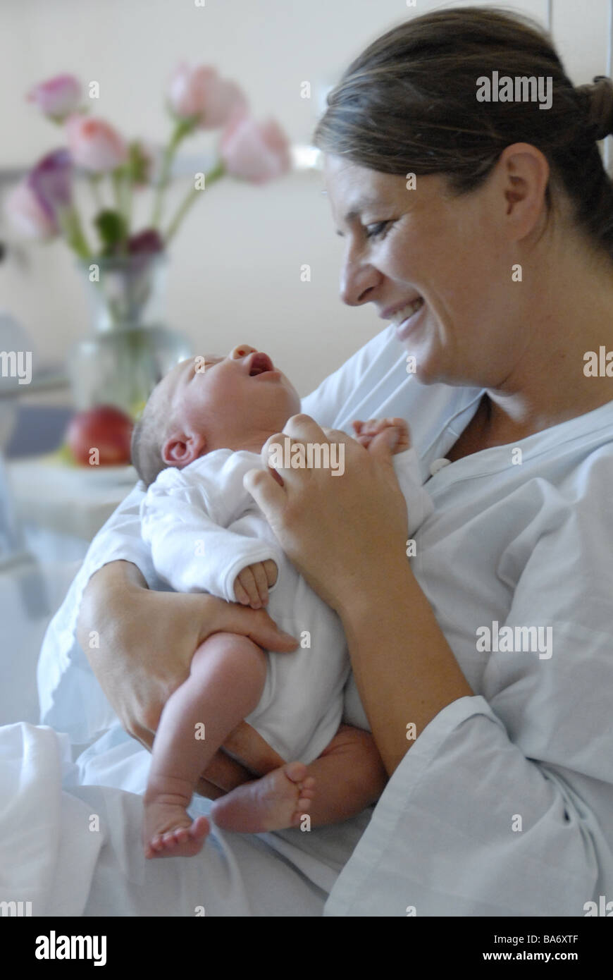 Hospital Delivery Station Mother Baby Holds Smiles Detail People Woman 30 40 Years 40 50 Years Infant Newborn 4 Days Old Symbol Stock Photo Alamy