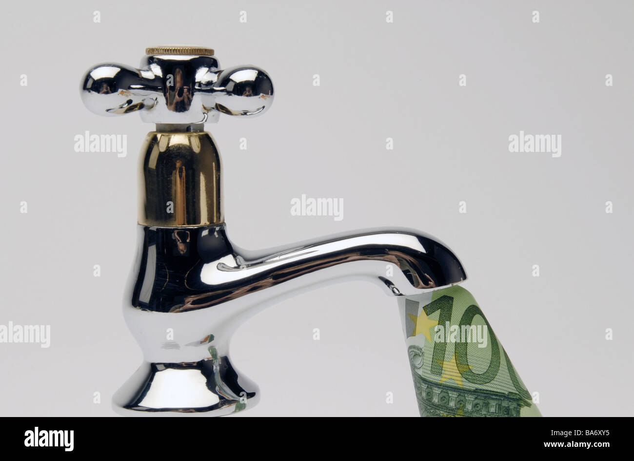 Faucet Euro-bill detail armature cock bill Euro hundred-Euro-appearance symbol water-costs costs extra expenses concept waste Stock Photo