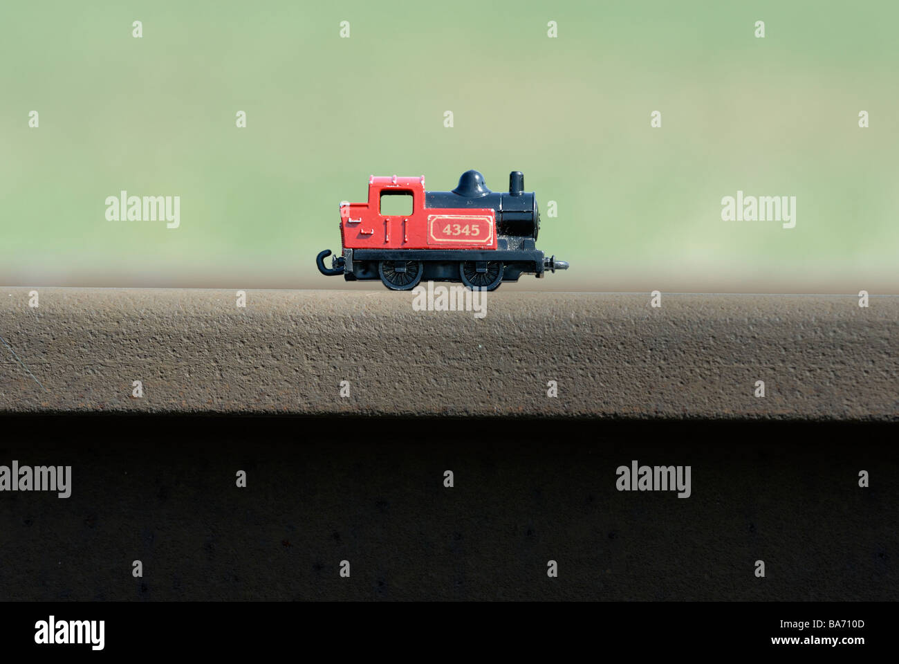 Steam engine, train model railway on real track outside