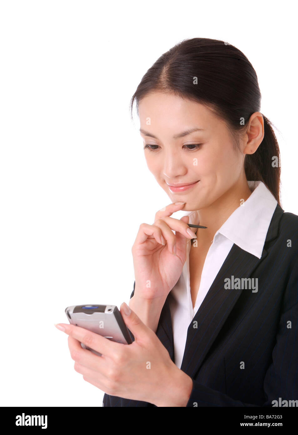 Businesswoman using PDA Stock Photo Alamy